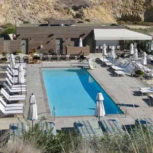an aerial view of a swimming pool