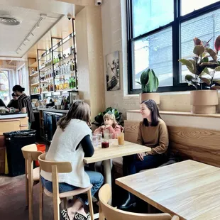 two women sitting at a table