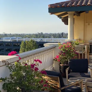 a balcony with a view of the city