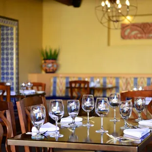 empty tables and chairs in a restaurant