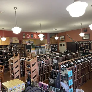 a man and woman in a liquor store