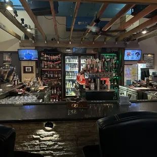a bar with a lot of liquor