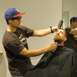 Gabe teaching at Cila Salon. Education is the Foundation!