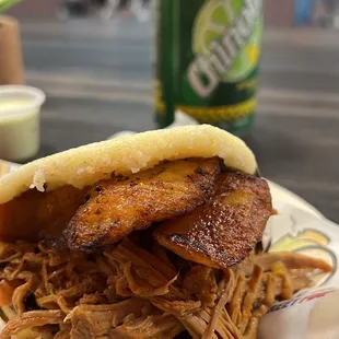 a pulled pork sandwich on a plate