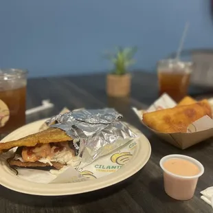 a plate of food and drinks