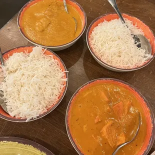 Chicken Korma on top left and Butter Chicken on bottom right