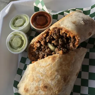 California Burrito with refried beans, spanish rice, onion, cilantro, and asada