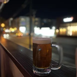 Draft beer and street view. I like an outside dining option!