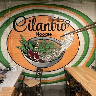 a mural of a bowl of noodles