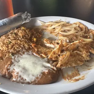 Apollo asada with rice, beans and fresh tortillas.