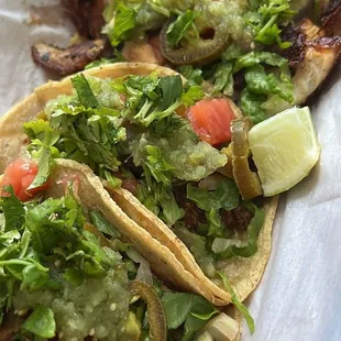 Chicken, carnitas, fish tacos