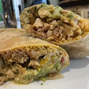 Chicken breast burrito with rice, beans, pico de gallo, guacamole, and cilantro cream salsa! This baby weighed 1lb and 13.8oz!