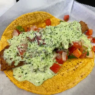 Fried fish taco with pico and creamy cilantro sauce!