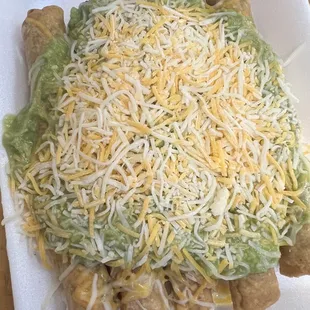 5 rolled tacos with guacamole &amp; cheese