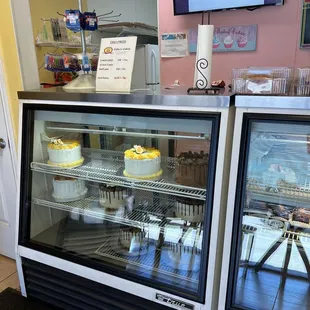 a display of cakes
