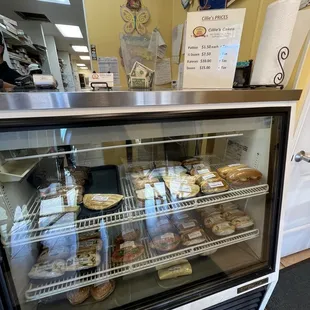 a display case filled with pastries