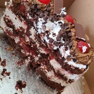 My cake w thick white frosting and little cake to enjoy