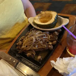 Steak with onions and mushrooms
