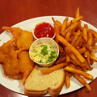 Shrimp and seasoned fries.