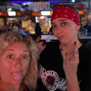 a woman sticking out her tongue