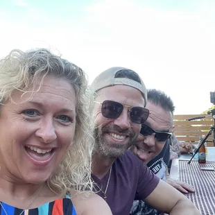 a group of people sitting at a table