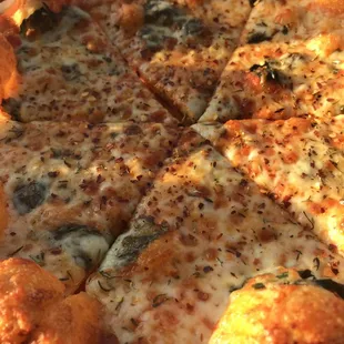 Freshly made margarita pizza with extra basil