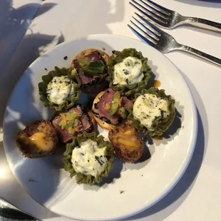 Wedding cocktail hour- Crab cakes, spinach and artichoke shells, and tuna tartare bites