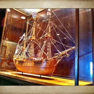 Cool model ship on the bookcase.