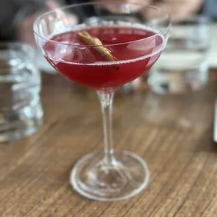 I wish I could remember the name of this cocktail! It was a mix of grapefruit and cinnamon flavors and it was delicious!