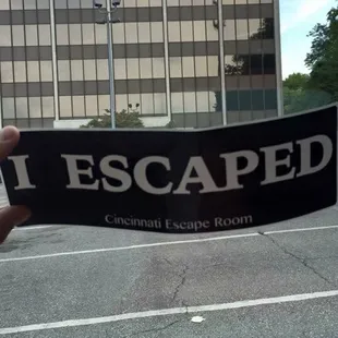 The bumper sticker they give you if you beat it! Outside of the office building where they're located