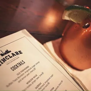 a drink in a copper mug