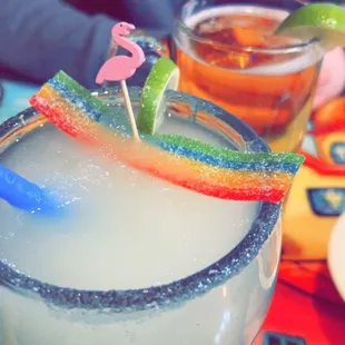Frozen margarita with sugar rim  so good! Cold tall mug of Pacifico in the back!