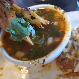 Birria dipped in consomme