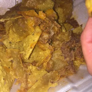 $10 nachos! No toppings or mexican cheese. They came soggy. Its disappointing because of the good reviews.
