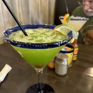 Melon Margarita. Regular margarita in the back ground.