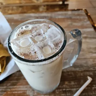 A horchata with cinnamon sprinkled on top, just like she said they don't do.