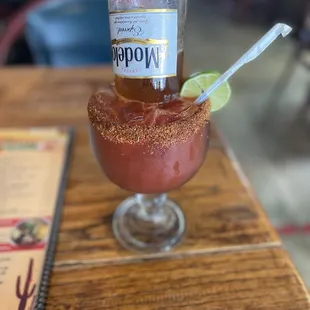 a drink in a glass on a table