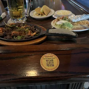 Lunch portion of fajitas. Very good value and quantity. Added a couple hard shell beef tacos.