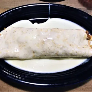 This is the Burrito Grande entree, substituting for cheese sauce instead of red sauce.  Photo taken December 8, 2018.