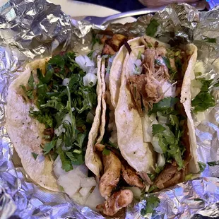 Steak taco, chicken taco, carnitas taco (street tacos with cilantro and onion)