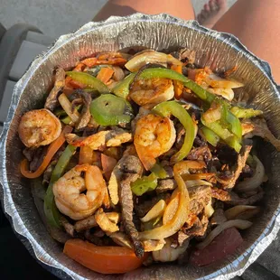 a person holding a bowl of food