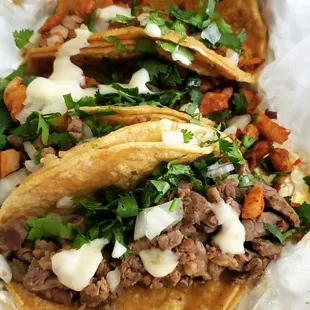 2 pollo tacos and 2 carne asada tacos