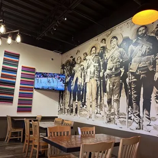 a large mural of mexican soldiers