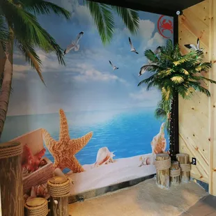 a mural of a beach scene