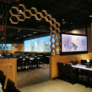 a restaurant with tables and chairs