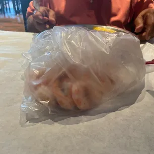 Shrimp, corn, &amp; potato served in bag.