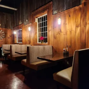 Our cozy booth seating area has become quite popular with guests.