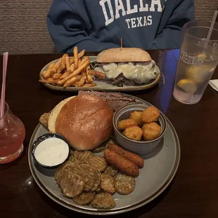 Brisket plate, fried pickles, and corn nuggets
