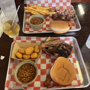 Brisket plate, baked beans, corn nuggets, and fries