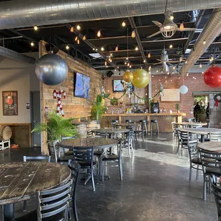 tables and chairs with balloons